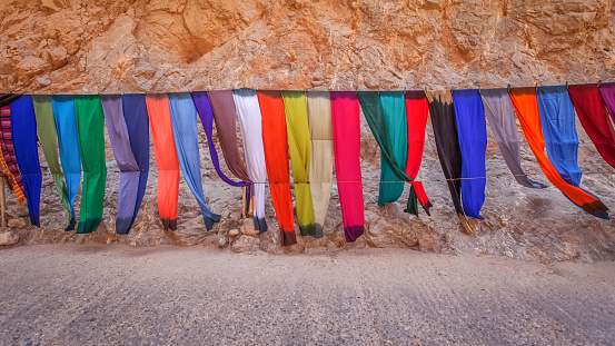 Moroccan scarves for sale in a market in the desert area of Todgha.