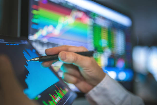 istock Business Team funds traders working selective stock forex and cryptocurrency trading charts and graphs on computer screen, concept  in bullmarket investment, finance concept 1293253852