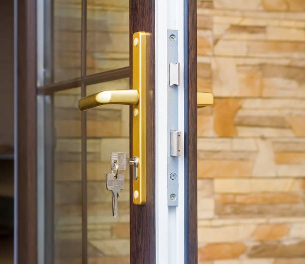 istock Fragment of a door with lock and keys. 1293263990