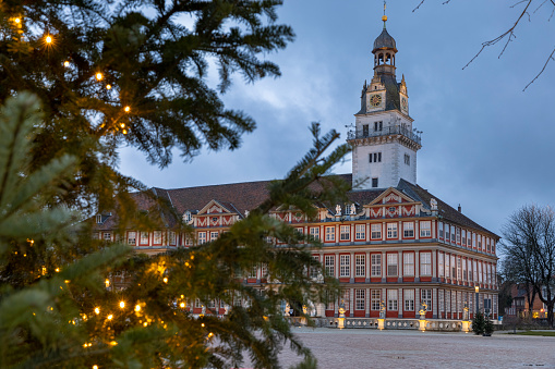 Wolfenbüttel, Germany - dec 24th 2020: German cities are beautifully illuminated for Christmas season. People are not able to fully enjoy this due to coronavirus lockdown.