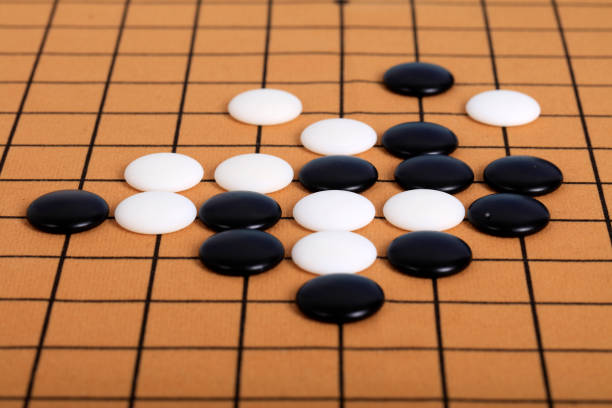 istock chinese game go,  Gobang and go game board 1293273452