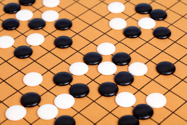 istock chinese game go,  Gobang and go game board 1293273475