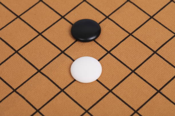 istock chinese game go,  Gobang and go game board 1293274029