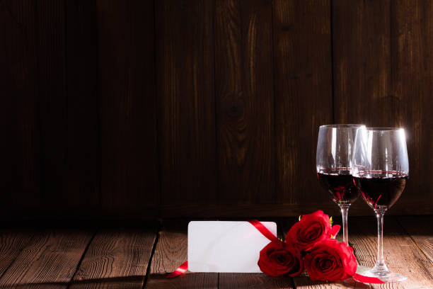 istock Wine roses and card 1293274084