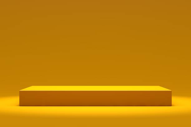 istock Yellow podium shelf or empty studio display on vivid summer background with minimal style. Blank stand for showing product. 1293275199