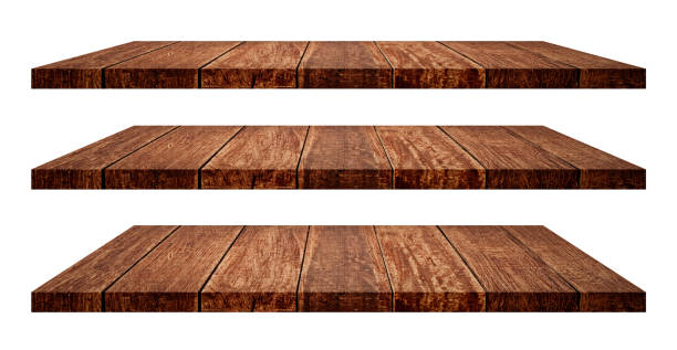 istock Empty dark wooden shelf isolated on white background. 1293279963