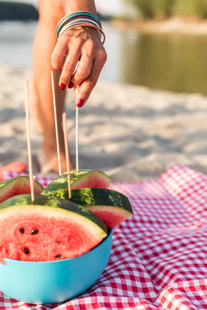 istock A refreshing slice of watermelon during a summer beach party 1293281360