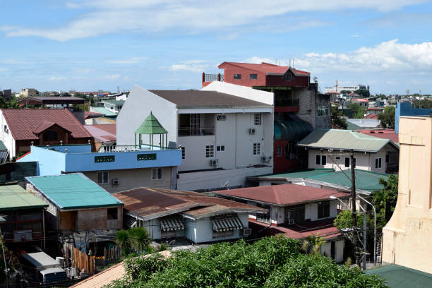 istock Rooftops of building in medium class urban community in Metro Manila 1293282992