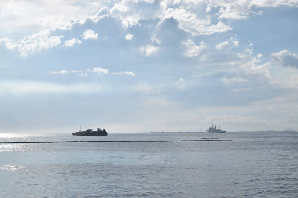 istock Offshore construction vessel anchored far from sea shore 1293283072