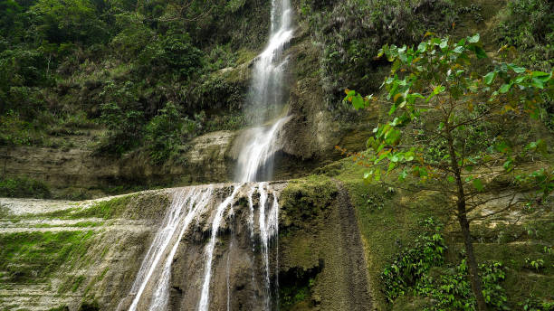 istock Beautiful tropical waterfall. Can-umantad Falls, Bohol, Philippines 1293283728