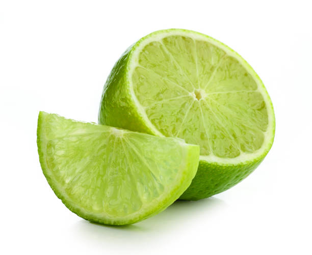 istock fresh ripe lime pieces isolated on white background 1293287115