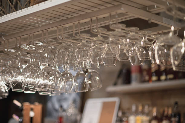 istock A row of empty glasses hang over the bar counter 1293287172