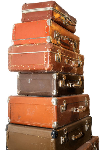 istock stack of old retro suitcases isolated on white background 1293288365