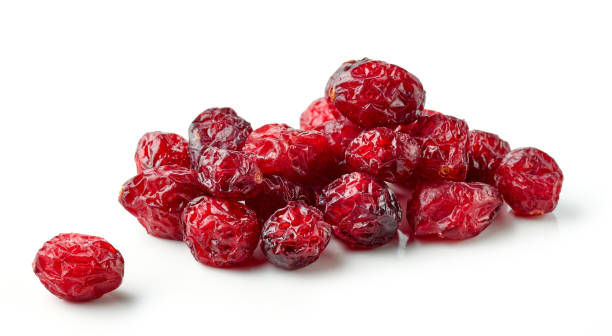 istock heap of dried cranberries isolated on white background 1293288452