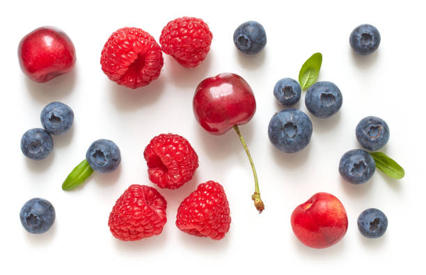 istock various fresh ripe berries isolated on white background, top view 1293291172