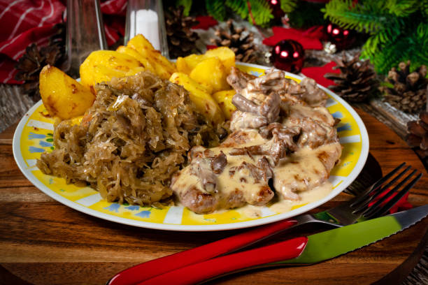 istock Stewed pork loin in a sauce with chanterelles. 1293292429