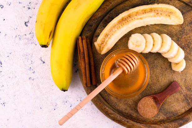 Bananas Honey Cinnamon White Background Flat Lay Copy Space