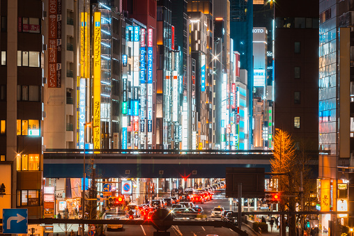 Tokyo glittering neon lights of Ginza at rush hour Japan