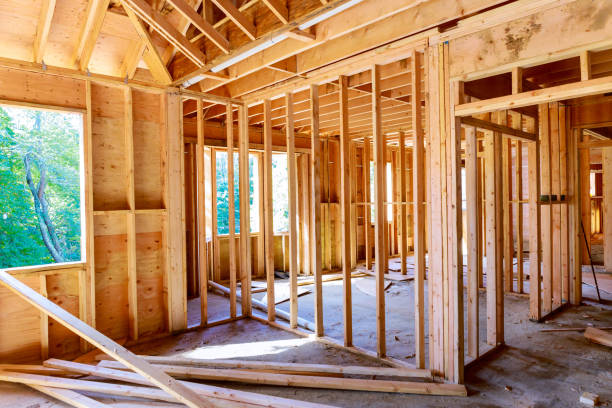 istock Framework wooden new house Construction home framing on residential beam 1293302594