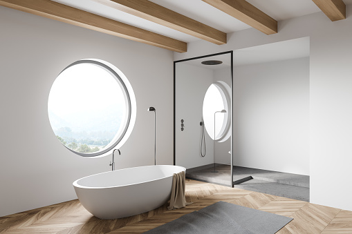 Corner of modern loft bathroom with white walls, wooden floor, comfortable bathtub and shower stall. 3d rendering