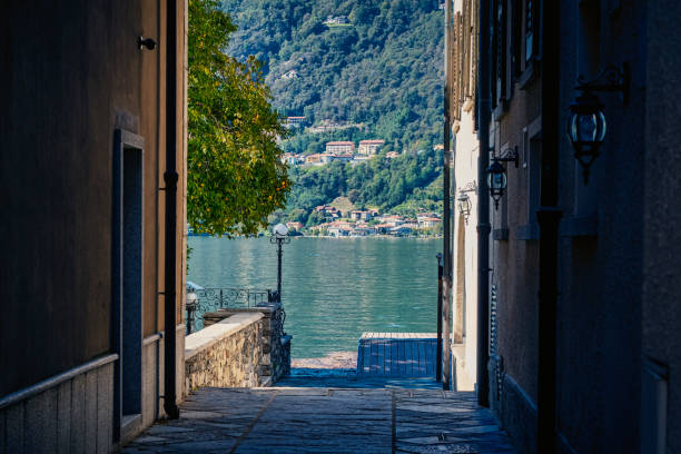 Early fall view of the Orta Lake (piedmont, Northern Italy) seen from the city of Orta, alog the lake shores. UNESCO World Heritage Site, it is home to a convent of cloistered nuns