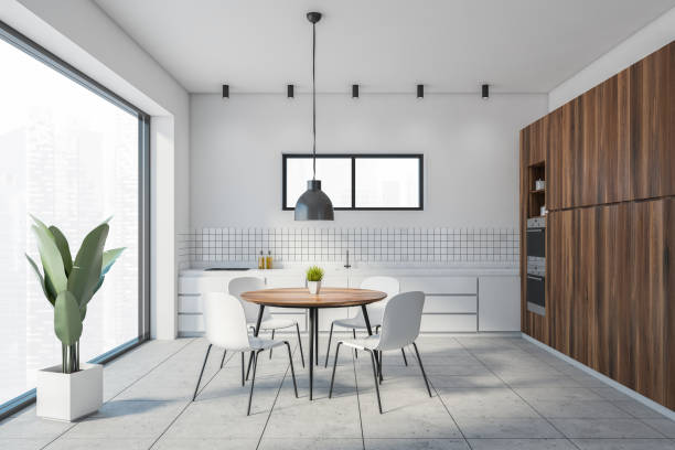 istock White and wooden dining room interior 1293303619