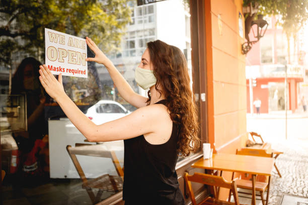 istock woman fixing information board written 