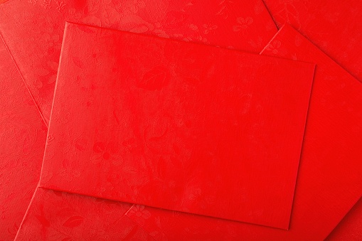 Background of many red envelopes stacked together for gift Chinese new year