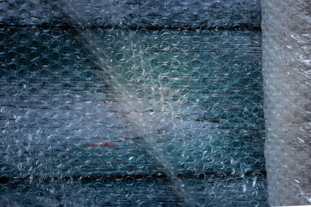 istock View of bubble pack and roll over a wooden background 1293316596