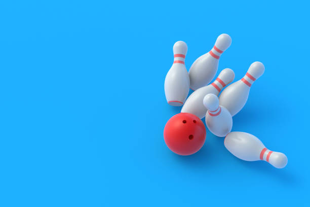 istock Red bowling ball crashing white falling pins on blue background. Active sport. Hobby and leisure. Competition and championship. Win and success concept. 3d rendering 1293318374