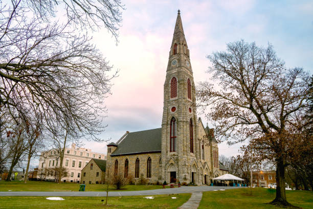 A landscape view of the historic First Presbyterian Church in Goshen. The church was built in 1871 and is the tallest structure in Orange County, NY. Goshen, NY - USA - Dec. 26, 2020: a landscape view of the historic First Presbyterian Church in Goshen. The church was built in 1871 and is the tallest structure in Orange County, NY. orange county new york stock pictures, royalty-free photos & images