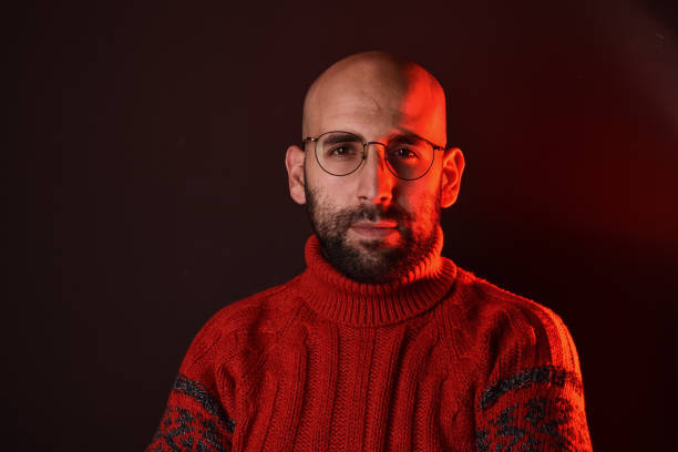 istock Thoughtful spectacles guy stock photo 1293320182