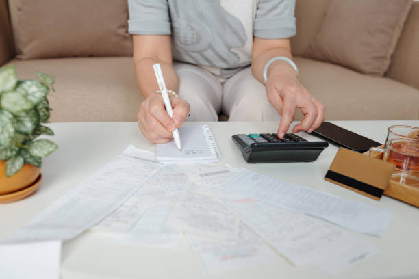istock Woman handles bookkeeping 1293320784