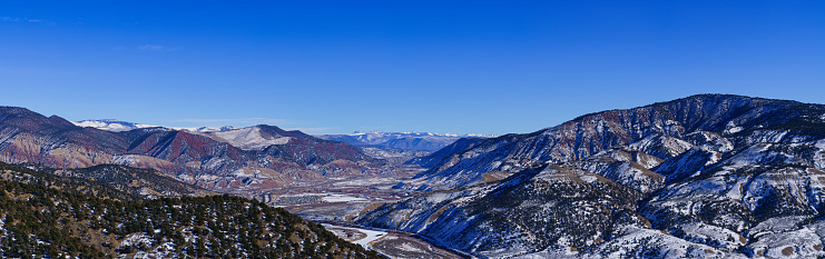 Vail Valley Colorado Winter Panorama - Scenic views looking east from Dotsero, Colorado toward the Gore Range and Vail, Colorado USA. High-resolution stitched with high levels of detail.