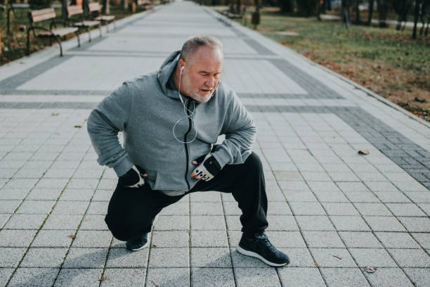 istock Tired senior man taking a break from exercising outdoors 1293327681