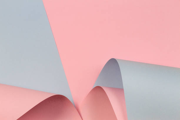 istock Abstract geometric shape pastel pink and light blue color paper background 1293332091