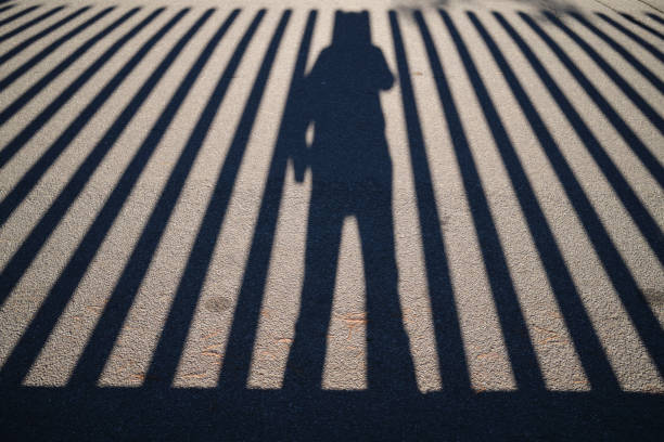 istock shadow on the street 1293333425