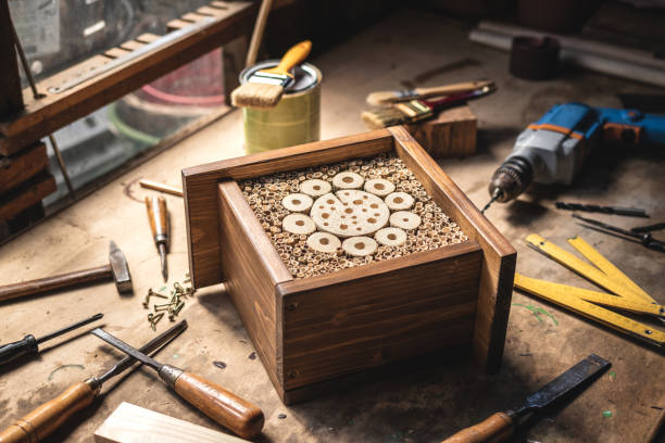 istock Insect hotel and work tools on wooden table 1293334184