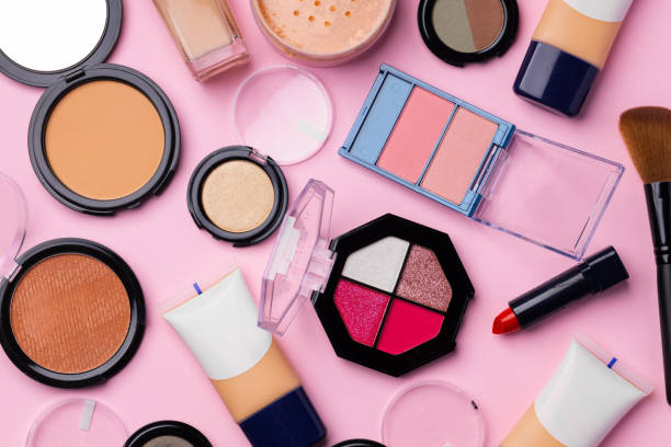 istock Complexion make up products and brush on pink background 1293334216