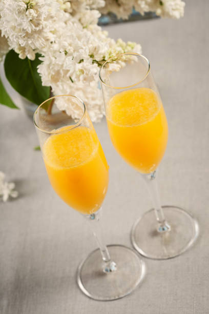 istock Two glasses of mimosa cocktail 1293335332