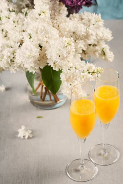 istock Two glasses of mimosa cocktail 1293335423