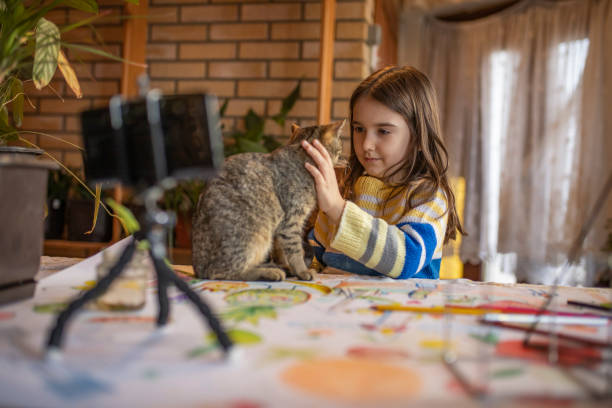 istock Small girl recording video about animals 1293339206