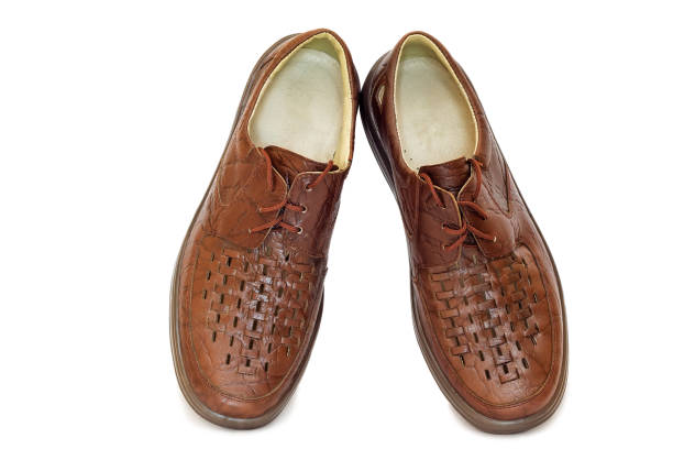 istock Men's leather shoes on a white background. 1293341483