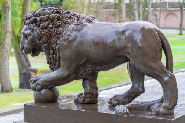 istock lion statue in the park. 1293345096