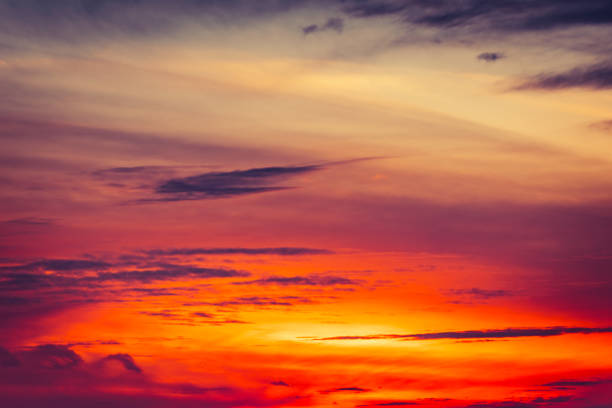 istock Beautiful colorful dramatic sky with clouds at sunset 1293345756