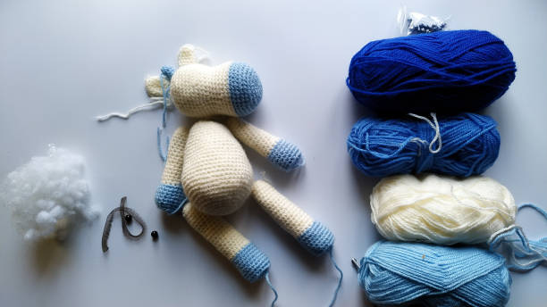 istock process and materials for crocheting handmade unicorn toy 1293352415