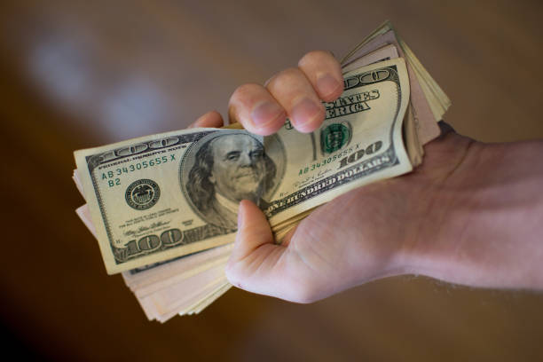 istock Fist Full of Dollars 1293363039