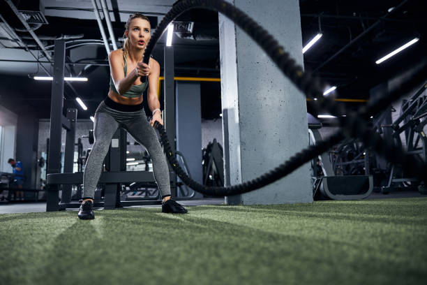 istock Sportsperson throwing the ropes up and away 1293364307
