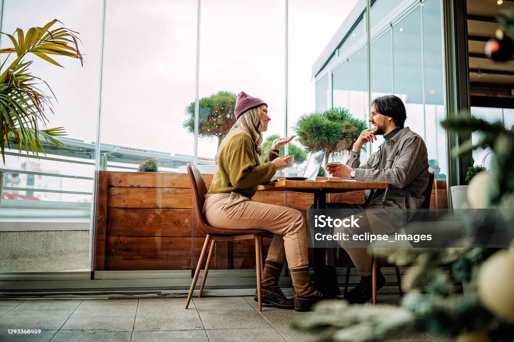 Thank you for your time Young couple doing freelance work in cafe Restaurant Stock Photo