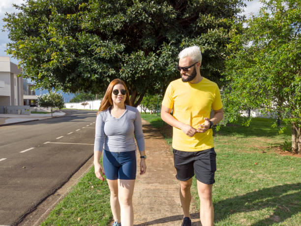 istock Young couple talking in a park. 1293372028
